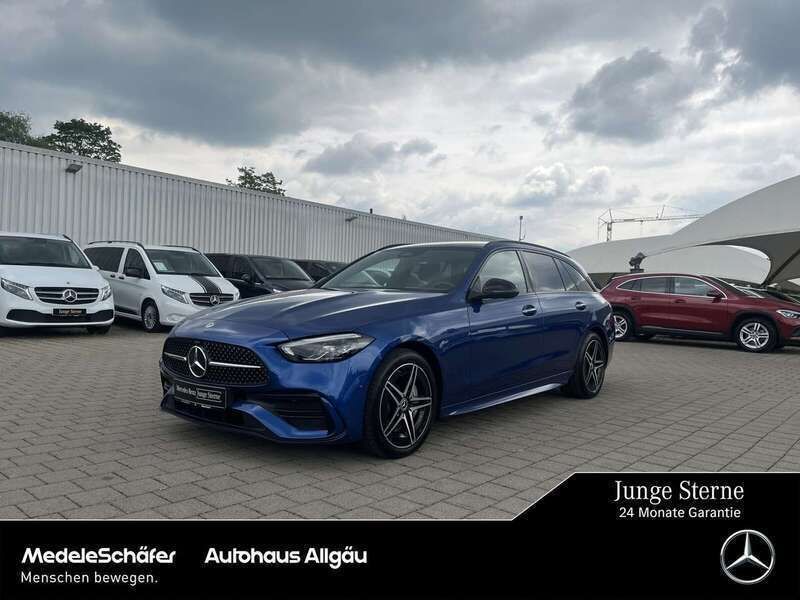 Lack spektralblau Gebraucht 2023 Mercedes C300e AMG Kombi | 47.470 € (Fairer Preis) - Bild 1/4
