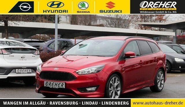 Candyrot metallic Gebraucht 2018 Ford Focus ST-Line Limousine | 15.980 € (Fairer Preis) - Bild 1/4