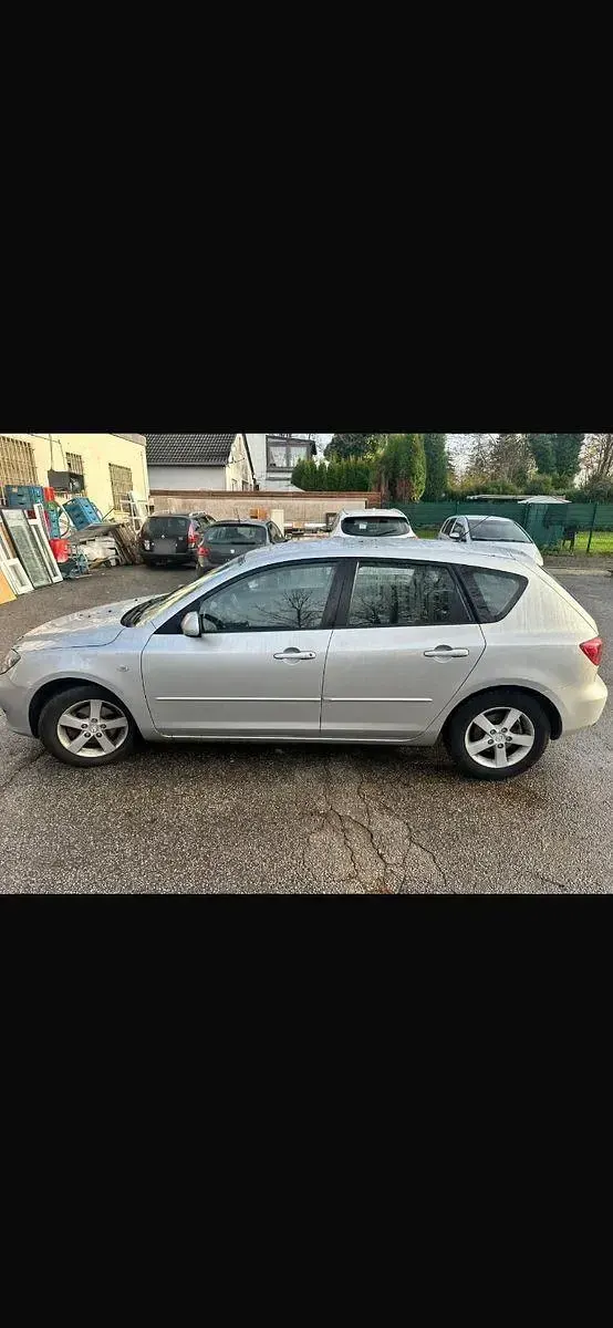 Używany Mazda 3 105 KM (77 kW) 2005 Srebrny Sedan/Limuzyna