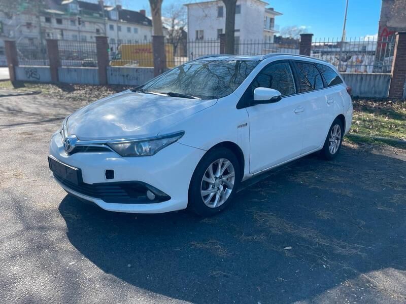 Weiß Gebraucht 2017 Toyota Auris Hybrid Kombi | 9.190 € - Bild 1/4