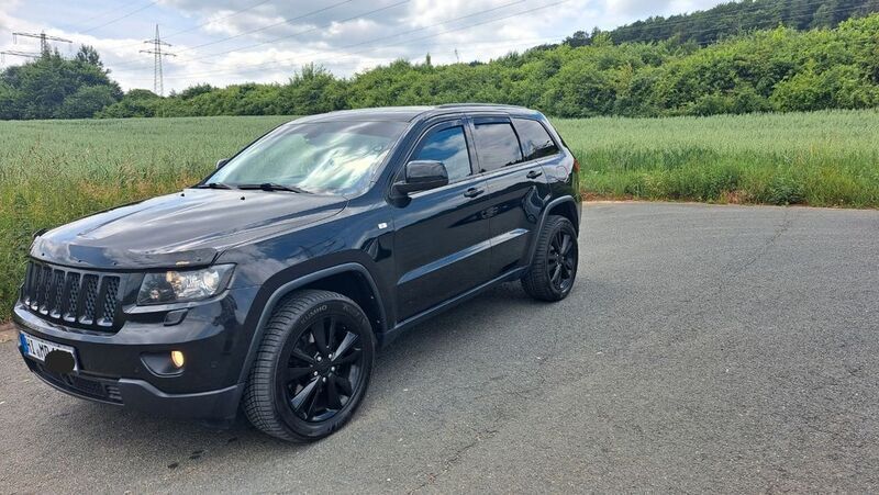 Schwarz Gebraucht 2013 Jeep Grand Cherokee Overland SUV | 12.700 € (Teuer) - Bild 1/4