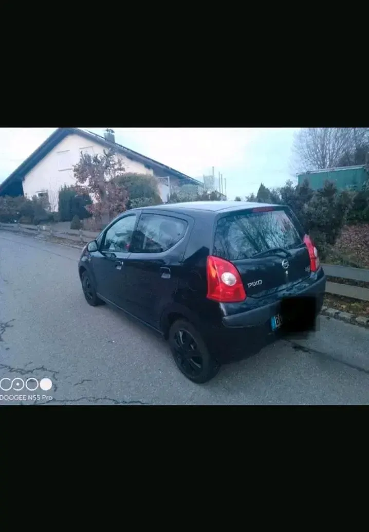 Gebraucht Nissan Pixo 68 PS (50 kW) 2010 Schwarz Kleinwagen