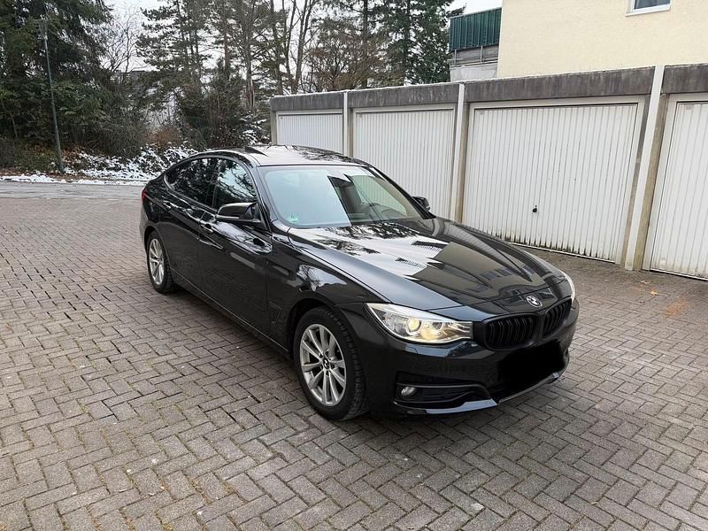 Schwarz Gebraucht 2014 BMW 318 Gran Turismo Limousine | 10.999 € (Fairer Preis) - Bild 1/4