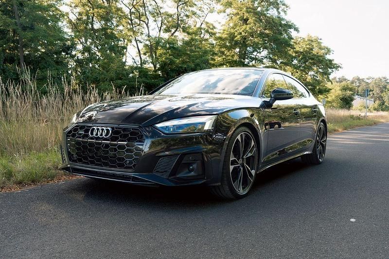Schwarz Gebraucht 2021 Audi A5 Sportback S-Line Kleinwagen | 33.700 € (Etwas zu teuer) - Bild 1/4
