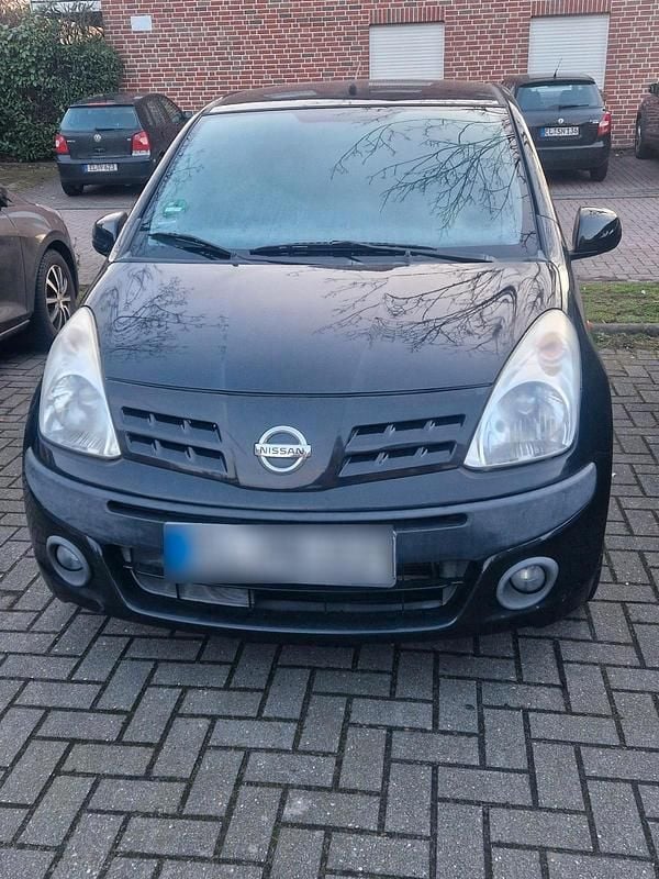 Gebraucht Nissan Pixo 65 PS (47 kW) 2009 Schwarz Kleinwagen