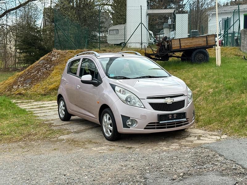 Second-hand Chevrolet Spark 82 CP (60 kW) 2012 Roșu Hatchback