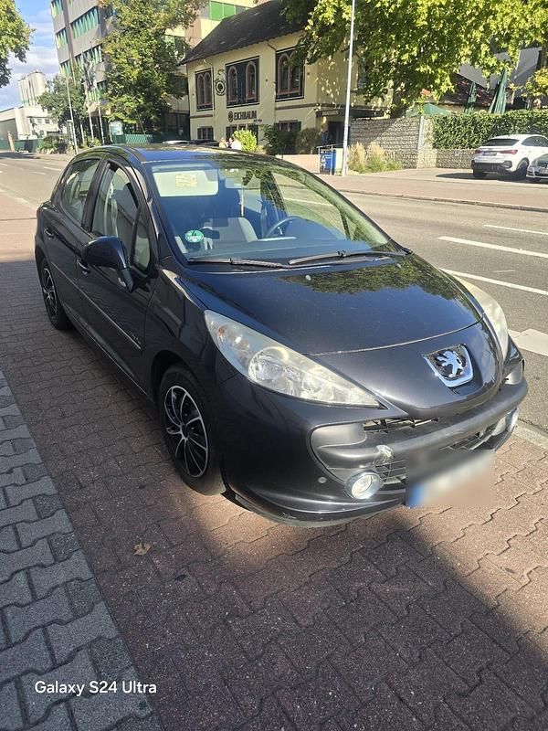 Gebraucht Peugeot 207 95 PS (69 kW) 2009 Schwarz Kleinwagen