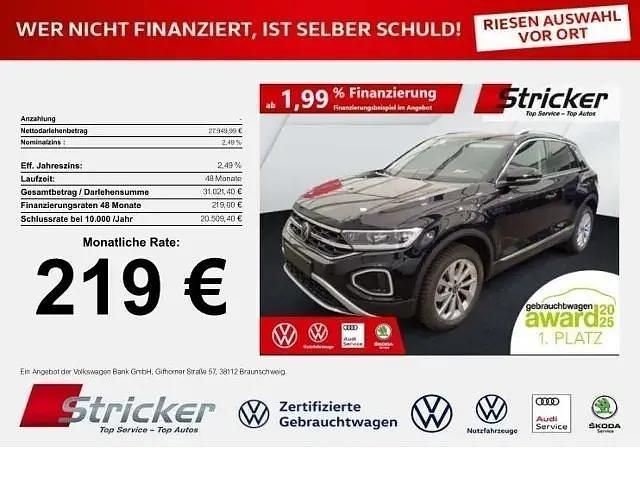 Schwarz (deep black perleffekt) Gebraucht 2024 VW T-Roc Style SUV | 27.946 € (Guter Preis) - Bild 1/3