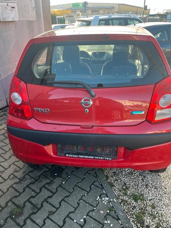 Gebraucht Nissan Pixo 68 PS (50 kW) 2009 Rot Kleinwagen