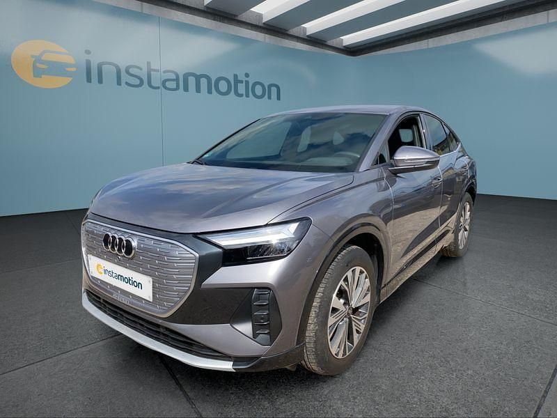 Grau Gebraucht 2022 Audi Q4 Sportback e-tron SUV | 30.599 € - Bild 1/4