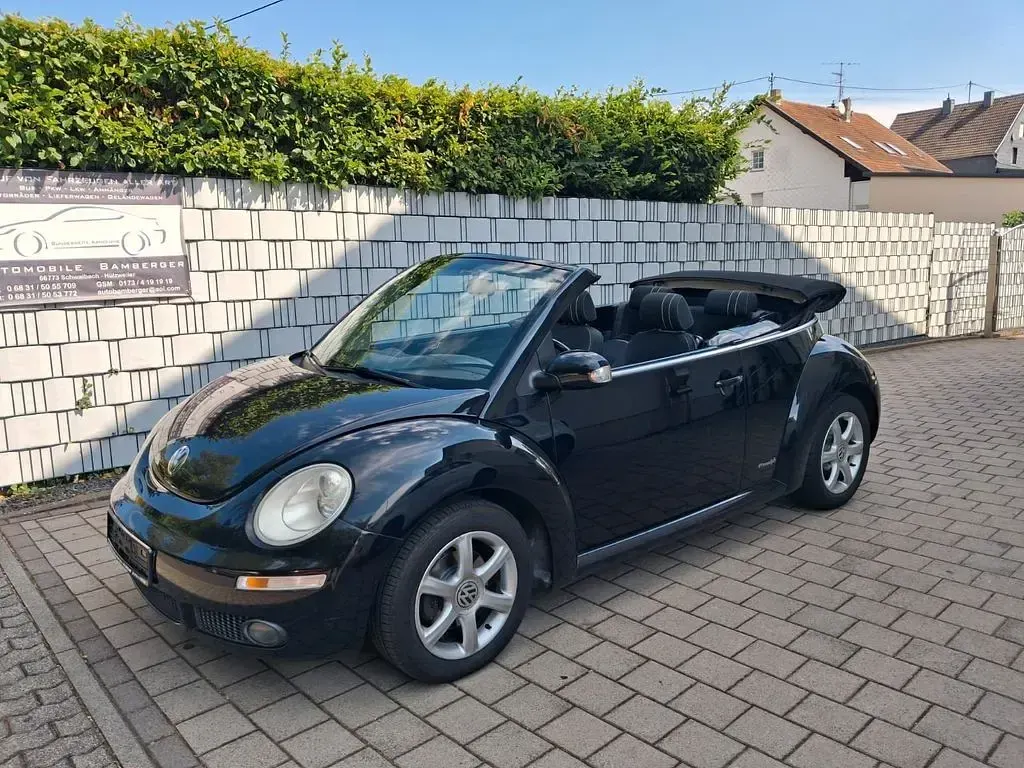 Gebraucht VW New Beetle Cabriolet 105 PS (77 kW) 2010 Schwarz Cabrio