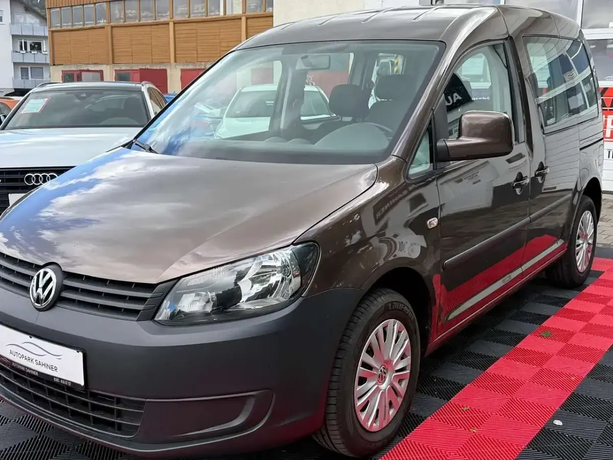 Używany VW Caddy 105 KM (77 kW) 2014 Brązowy Minivan