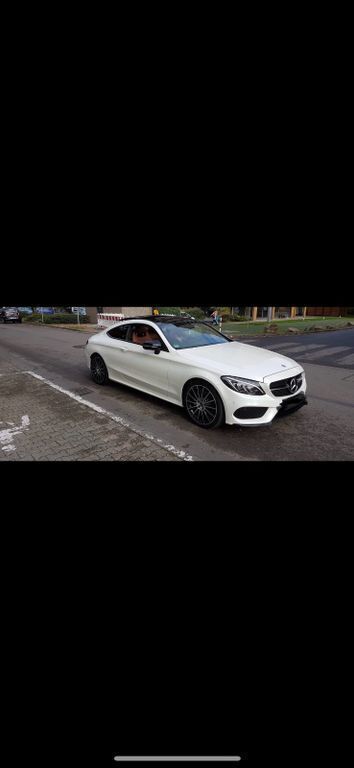 Weiß Gebraucht 2017 Mercedes C220 AMG Coupé | 20.800 € (Fairer Preis) - Bild 1/4