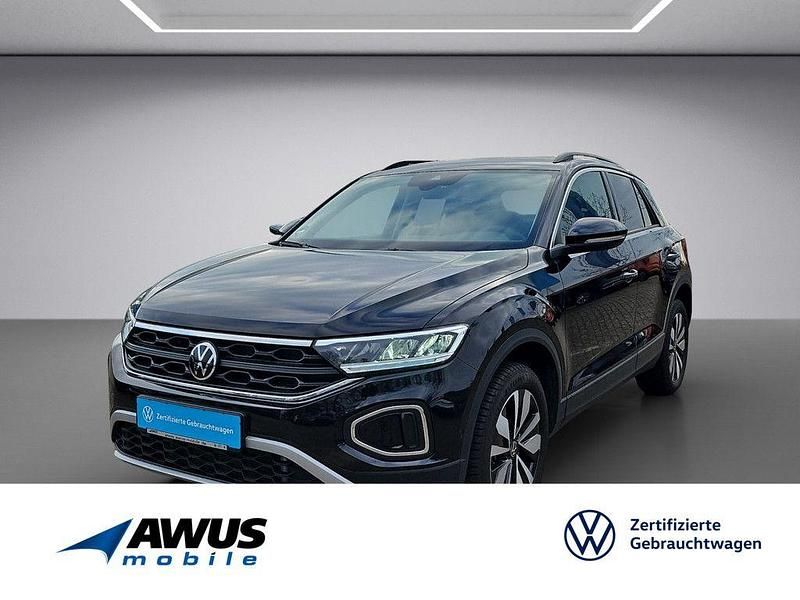 Schwarz / deep black (metallic) Gebraucht 2024 VW T-Roc Move SUV | 28.490 € (Superpreis) - Bild 1/4