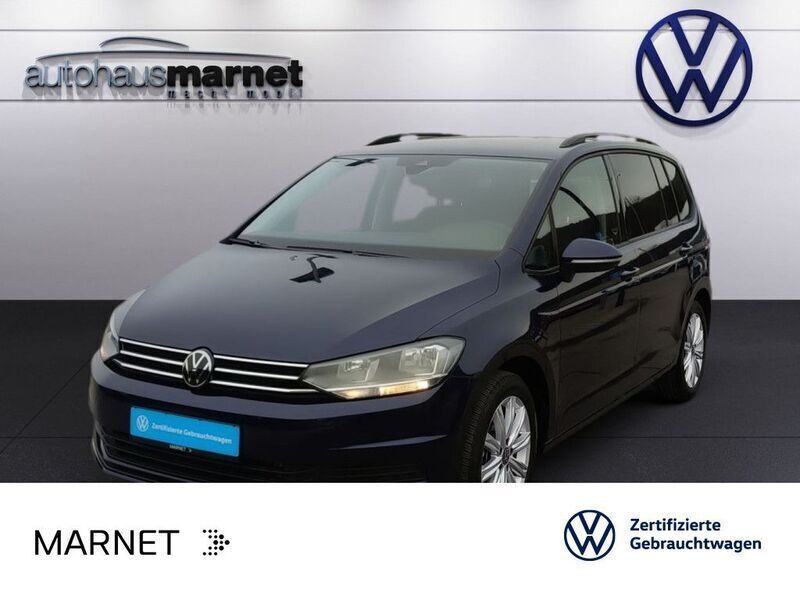 Atlantik blue metallic Gebraucht 2024 VW Touran Comfortline Van / Kleinbus | 33.490 € (Fairer Preis) - Bild 1/3