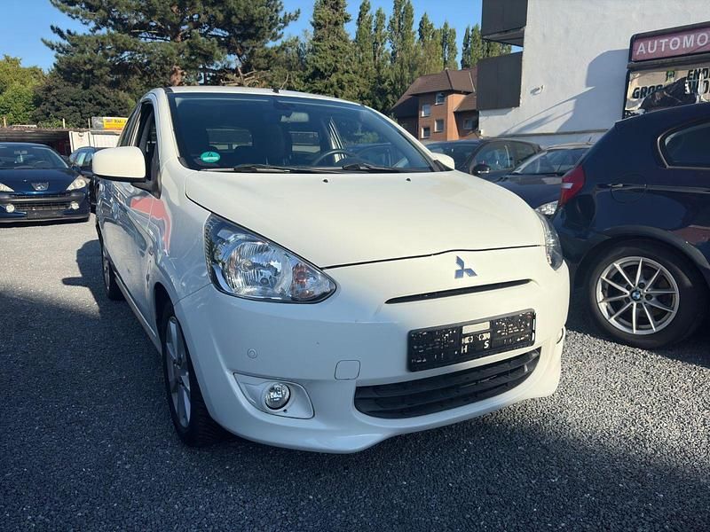 Weiß Gebraucht 2013 Mitsubishi Space Star Kleinwagen | 3.999 € (Fairer Preis) - Bild 1/4