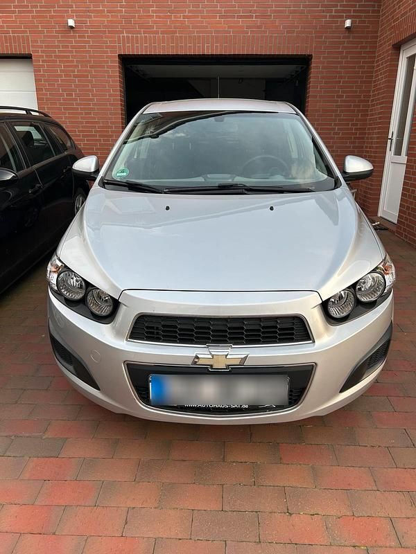 Second-hand Chevrolet Aveo 86 CP (63 kW) 2012 Argintiu Hatchback