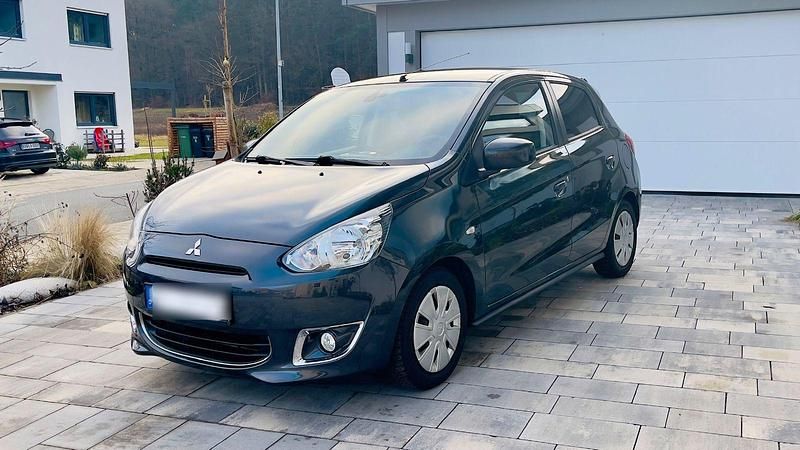 Grau Gebraucht 2014 Mitsubishi Space Star Kleinwagen | 4.590 € (Fairer Preis) - Bild 1/4