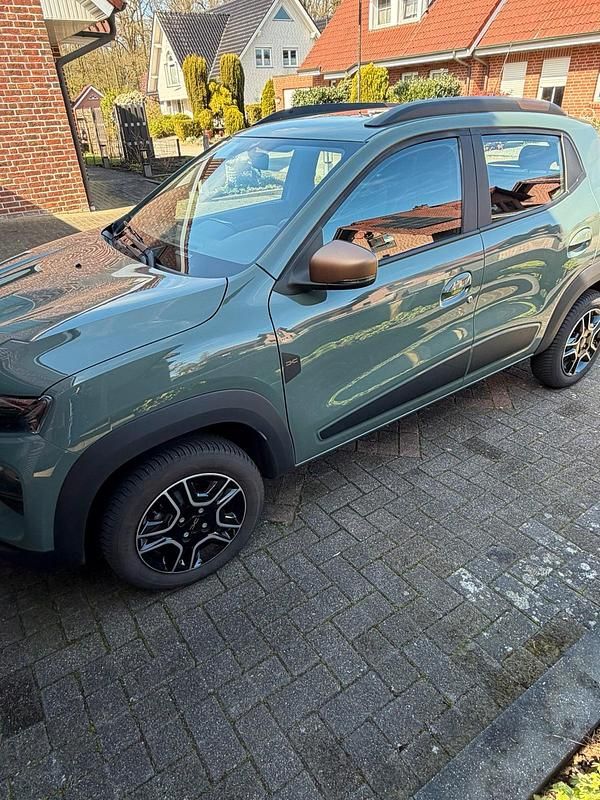 Gebraucht Dacia Spring Extreme 47 kW (65 PS) 2023 Grün Kleinwagen