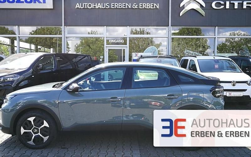 Grün Neu 2025 Citroën e-C4 Limousine | 32.990 € - Bild 1/4