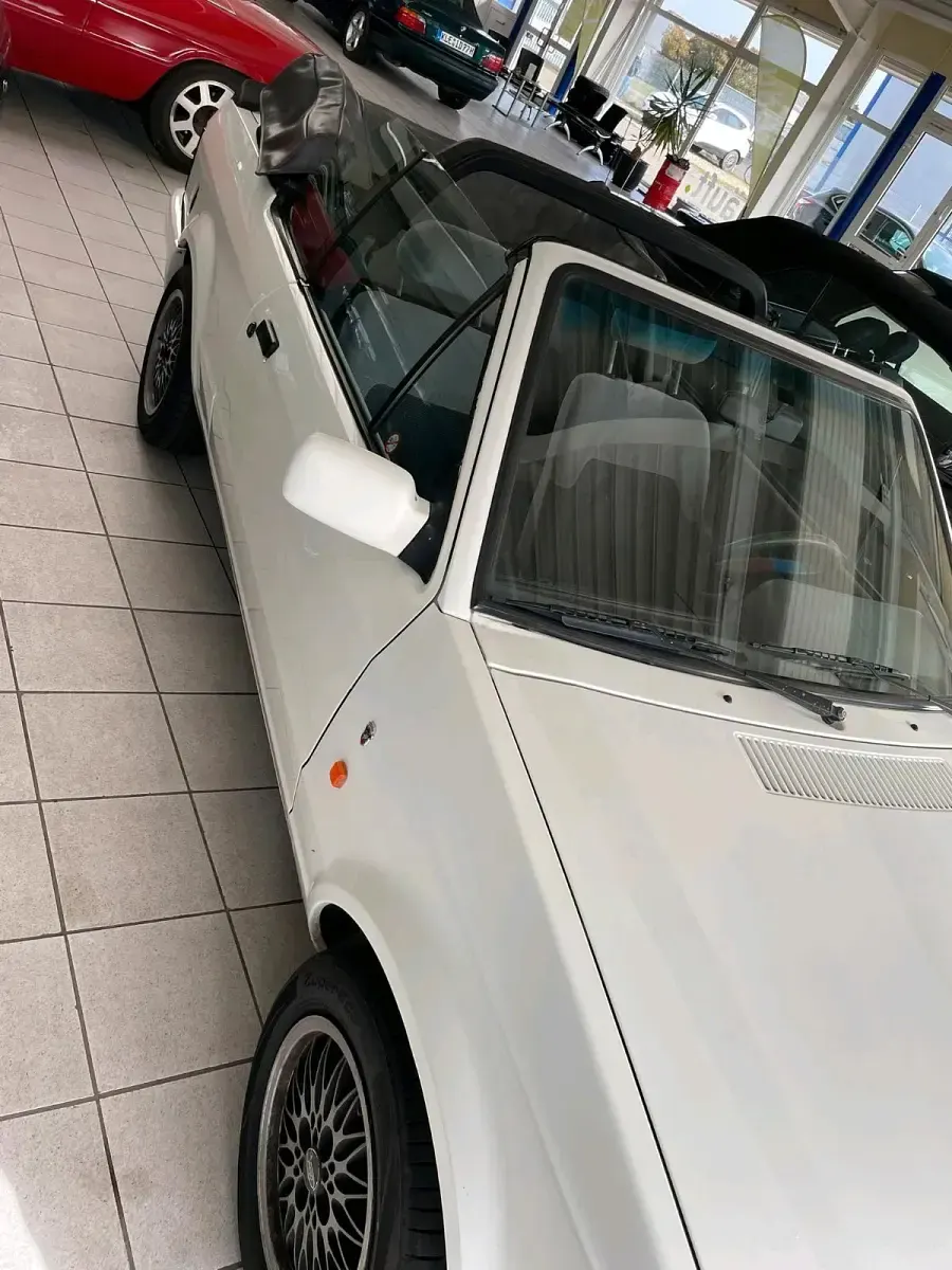 Gebraucht Ford Escort Cabriolet 75 PS (55 kW) 1990 Weiß Cabrio