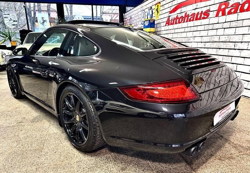 Schwarz (metallic) Gebraucht 2007 Porsche 911 Carrera Sport Coupé | 44.895 € (Superpreis) - Bild 1/4