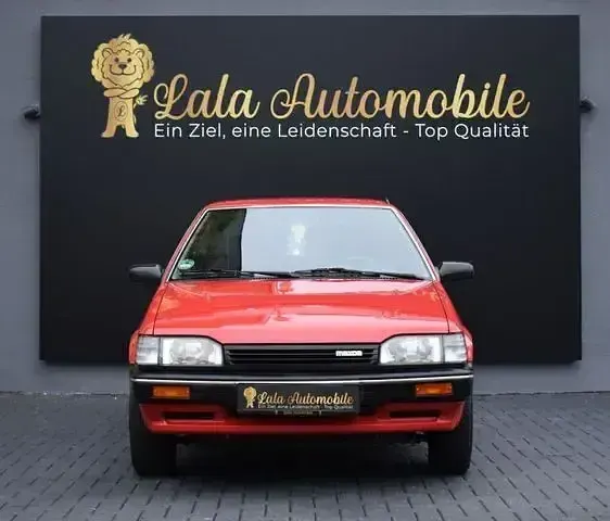 Gebraucht Mazda 323 75 PS (55 kW) 1988 Rot Kleinwagen