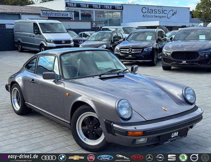 Grau Gebraucht 1986 Porsche 911 Carrera Coupé | 89.930 € - Bild 1/4