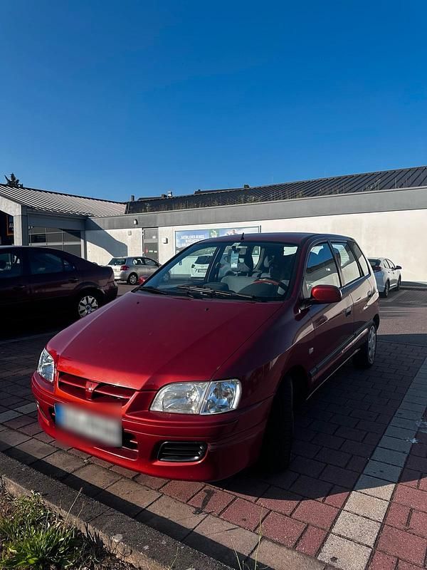 Gebraucht Mitsubishi Space Star 82 PS (60 kW) 2002 Rot Van / Kleinbus