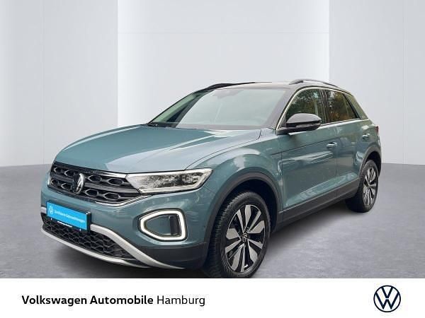 Blau (petroleum blue metallic/schwarz) Gebraucht 2025 VW T-Roc Goal SUV | 30.951 € (Guter Preis) - Bild 1/4