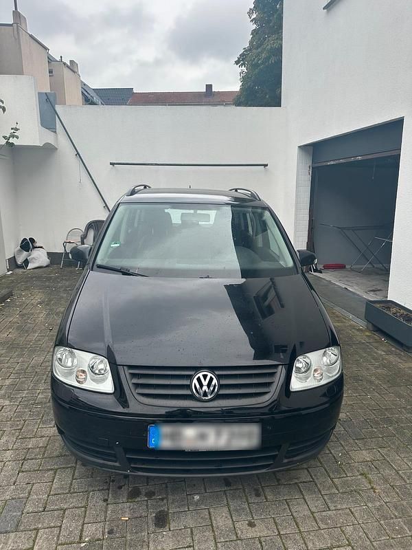 Gebraucht VW Touran 106 PS (77 kW) 2005 Schwarz Van / Kleinbus