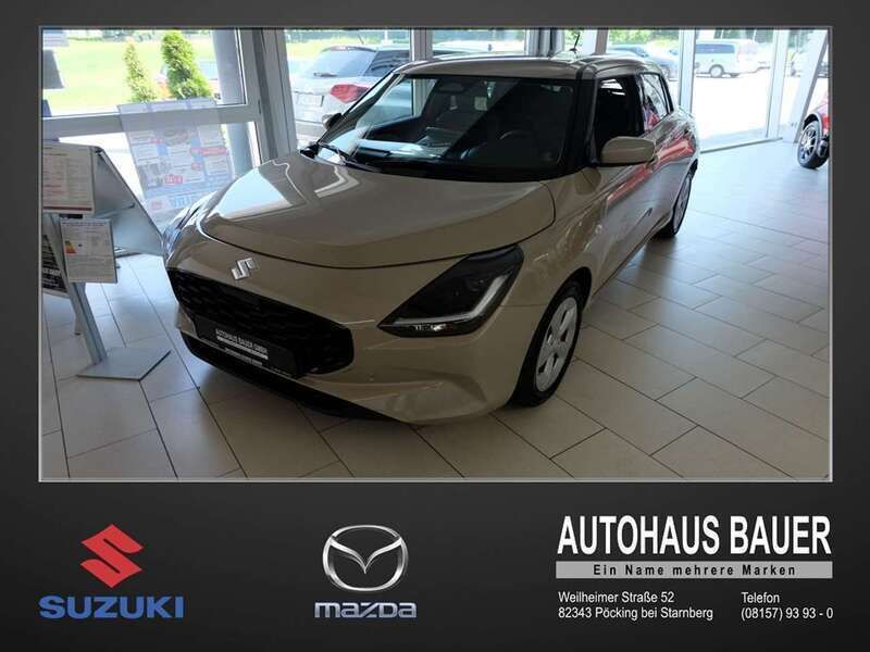 Caravan ivory met Neu 2025 Suzuki Swift Comfort Kleinwagen | 18.590 € - Bild 1/4