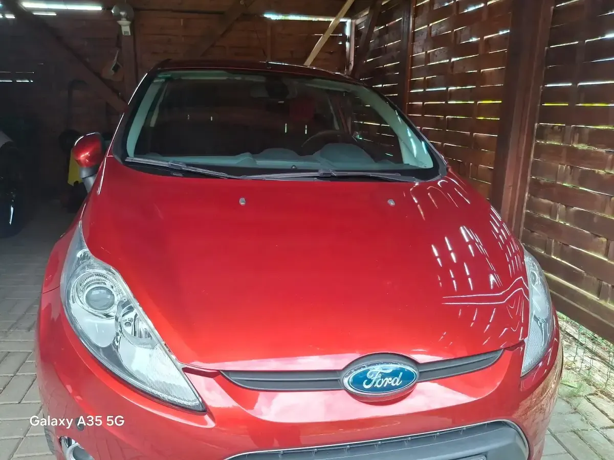 Gebraucht Ford Fiesta 96 PS (70 kW) 2009 Orange Coupé