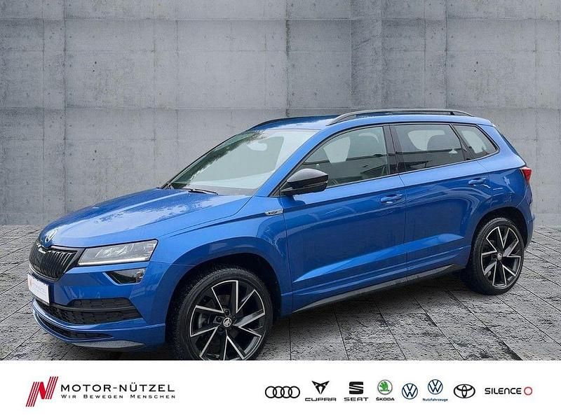 Raceblau metallic Gebraucht 2021 Skoda Karoq SportLine SUV | 30.920 € (Fairer Preis) - Bild 1/4
