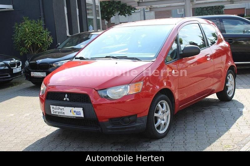 Gebraucht Mitsubishi Colt Inform 95 PS (69 kW) 2009 Rot Kleinwagen