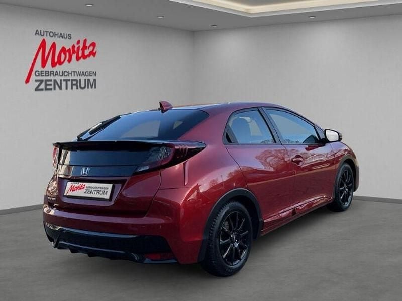 Gebraucht Honda Civic Elegance 141 PS (103 kW) 2015 Passion red p. (metallic) Limousine