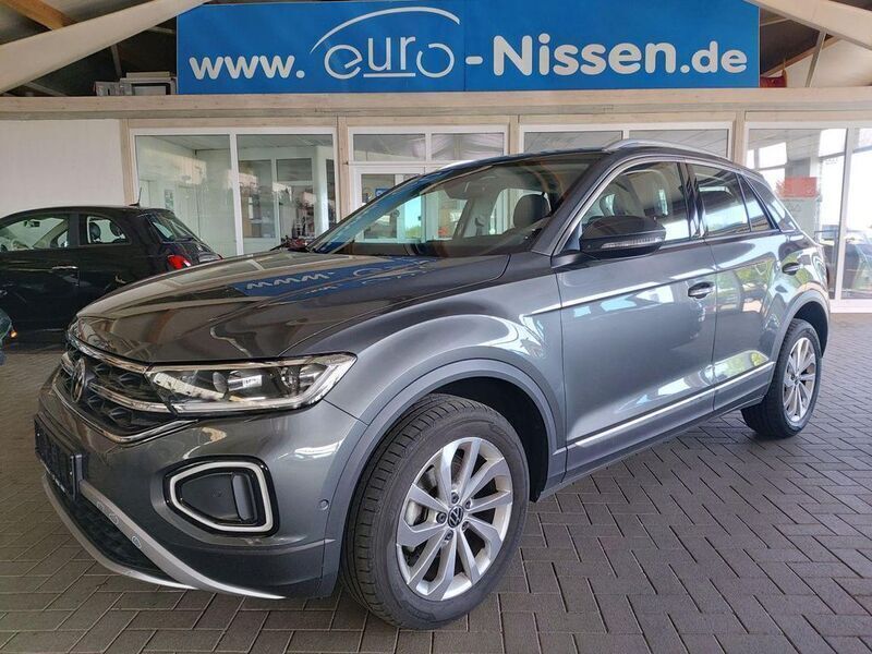 Indiumgrau Gebraucht 2024 VW T-Roc Edition SUV | 29.490 € (Fairer Preis) - Bild 1/4
