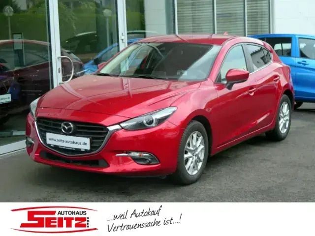 Rot Gebraucht 2017 Mazda 3 Exclusive-Line Limousine | 16.780 € (Etwas zu teuer) - Bild 1/4