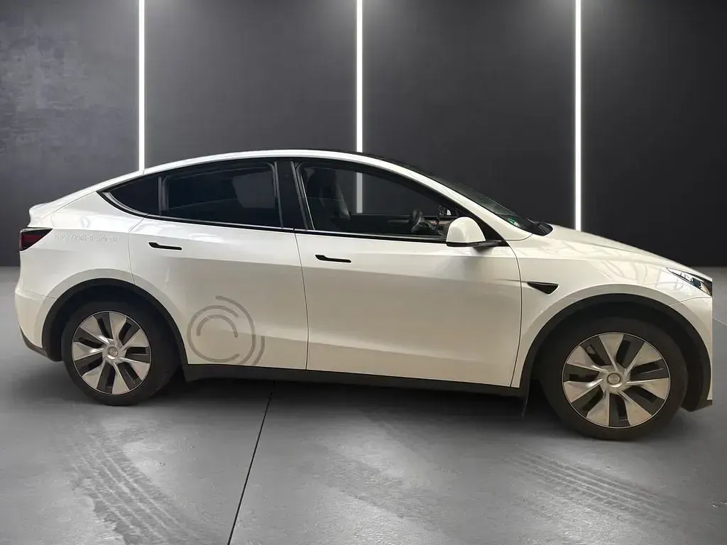 Gebraucht Tesla Model Y RWD 219 kW (299 PS) 2024 Pearl white multi coat SUV