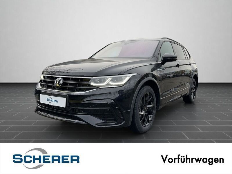 Deep black perleffekt (metallic) Gebraucht 2024 VW Tiguan Allspace R-line SUV | 49.890 € (Teuer) - Bild 1/4