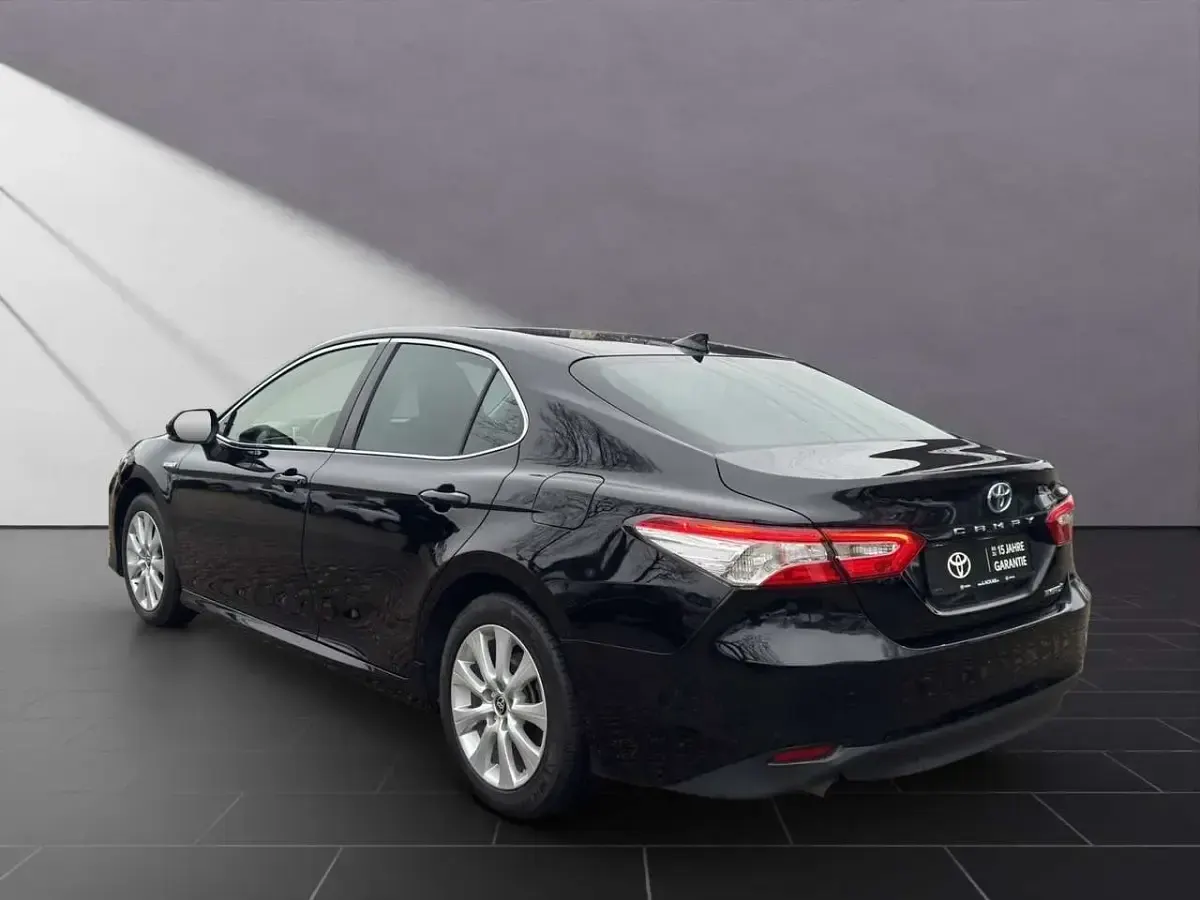 Gebraucht Toyota Camry Hybrid 178 PS (130 kW) 2021 Schwarz Limousine