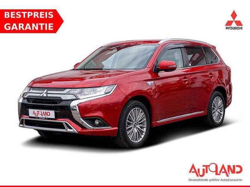 Dynamik rot (metallic) Gebraucht 2020 Mitsubishi Outlander P-HEV SUV | 22.990 € (Fairer Preis) - Bild 1/4
