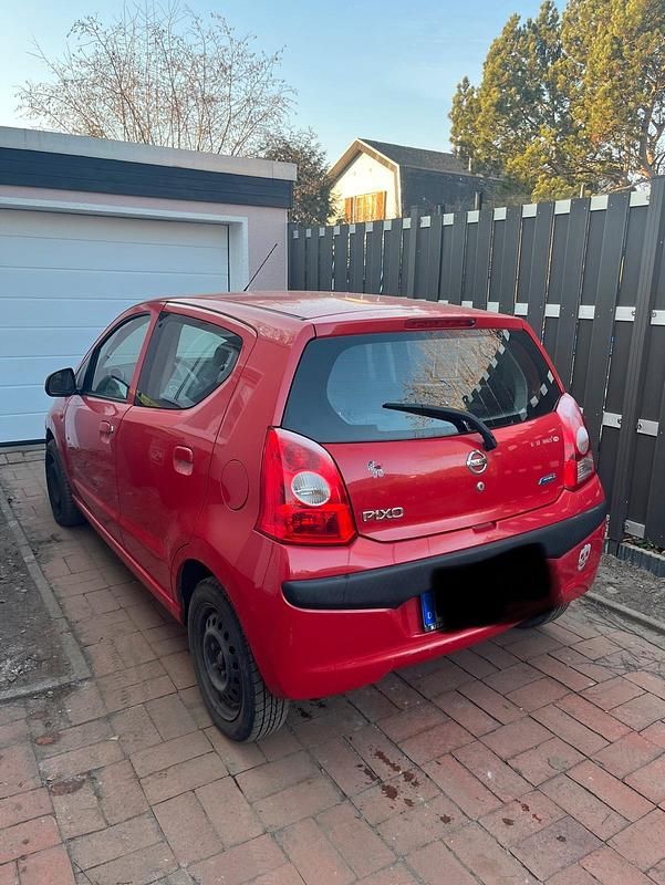 Gebraucht Nissan Pixo 68 PS (50 kW) 2009 Rot Kleinwagen