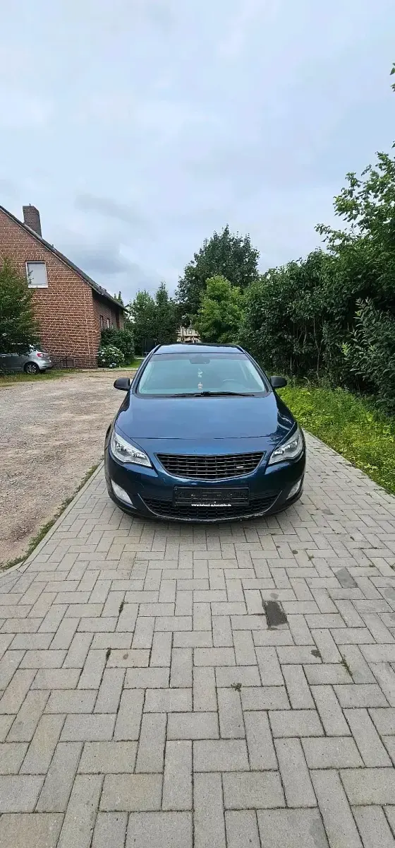 Gebraucht Opel Astra 125 PS (91 kW) 2011 Blau Kombi