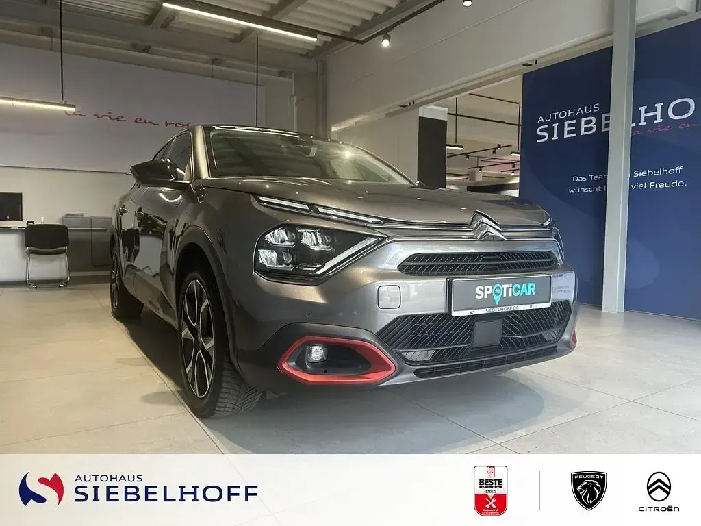 Gebraucht Citroën e-C4 Shine 100 kW (136 PS) 2022 Platinium grau Limousine