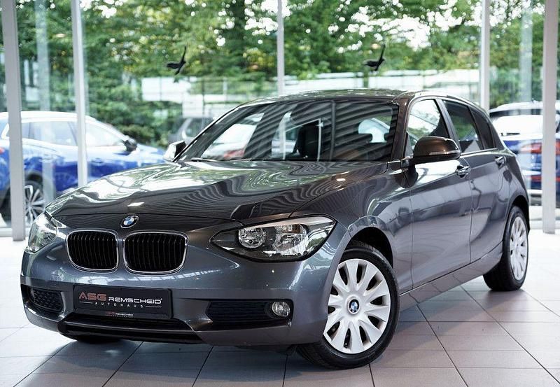 Grau Gebraucht 2014 BMW 116 Sport Line Kleinwagen | 5.490 € (Guter Preis) - Bild 1/4
