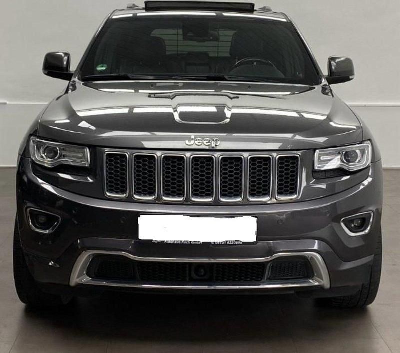 Grau Gebraucht 2016 Jeep Grand Cherokee Overland SUV | 21.449 € (Fairer Preis) - Bild 1/4
