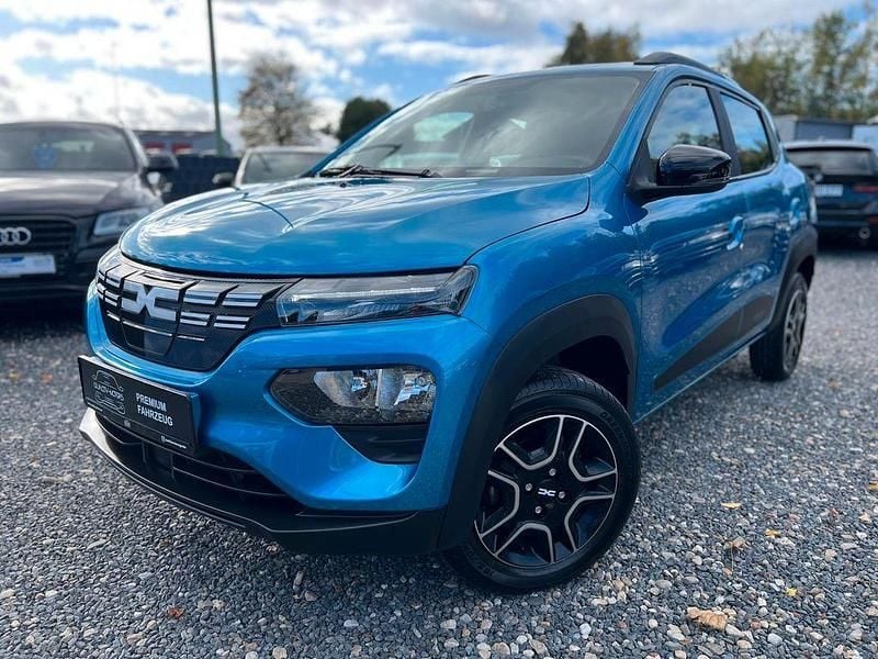 Blau Gebraucht 2023 Dacia Spring Expression Kleinwagen | 9.490 € (Superpreis) - Bild 1/4