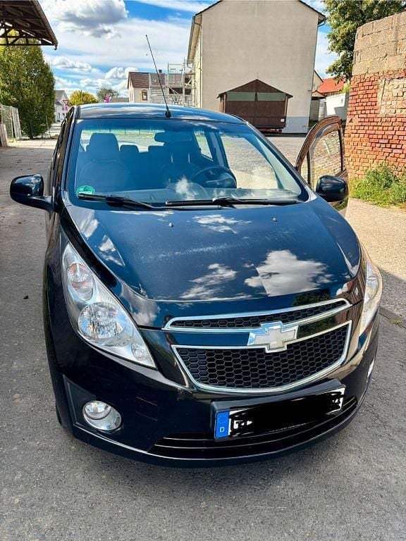 Schwarz Gebraucht 2010 Chevrolet Spark Kleinwagen | 2.450 € (Fairer Preis) - Bild 1/4