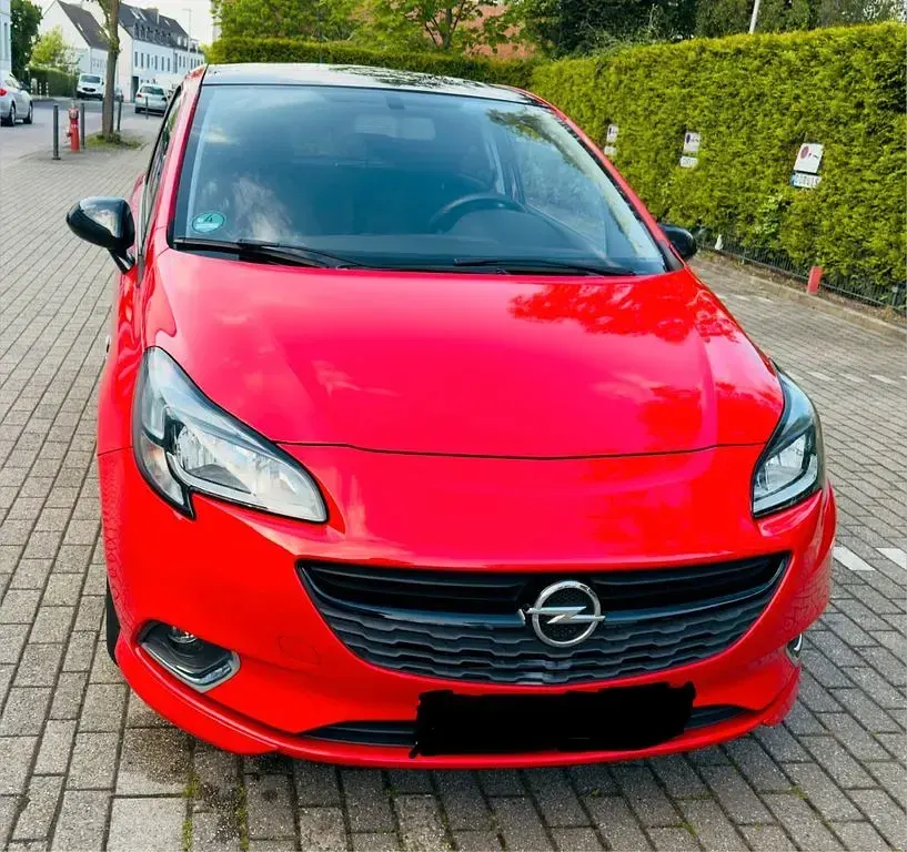 Usado Opel Corsa Color Edition 101 HP (74 kW) 2015 Vermelho Citadino